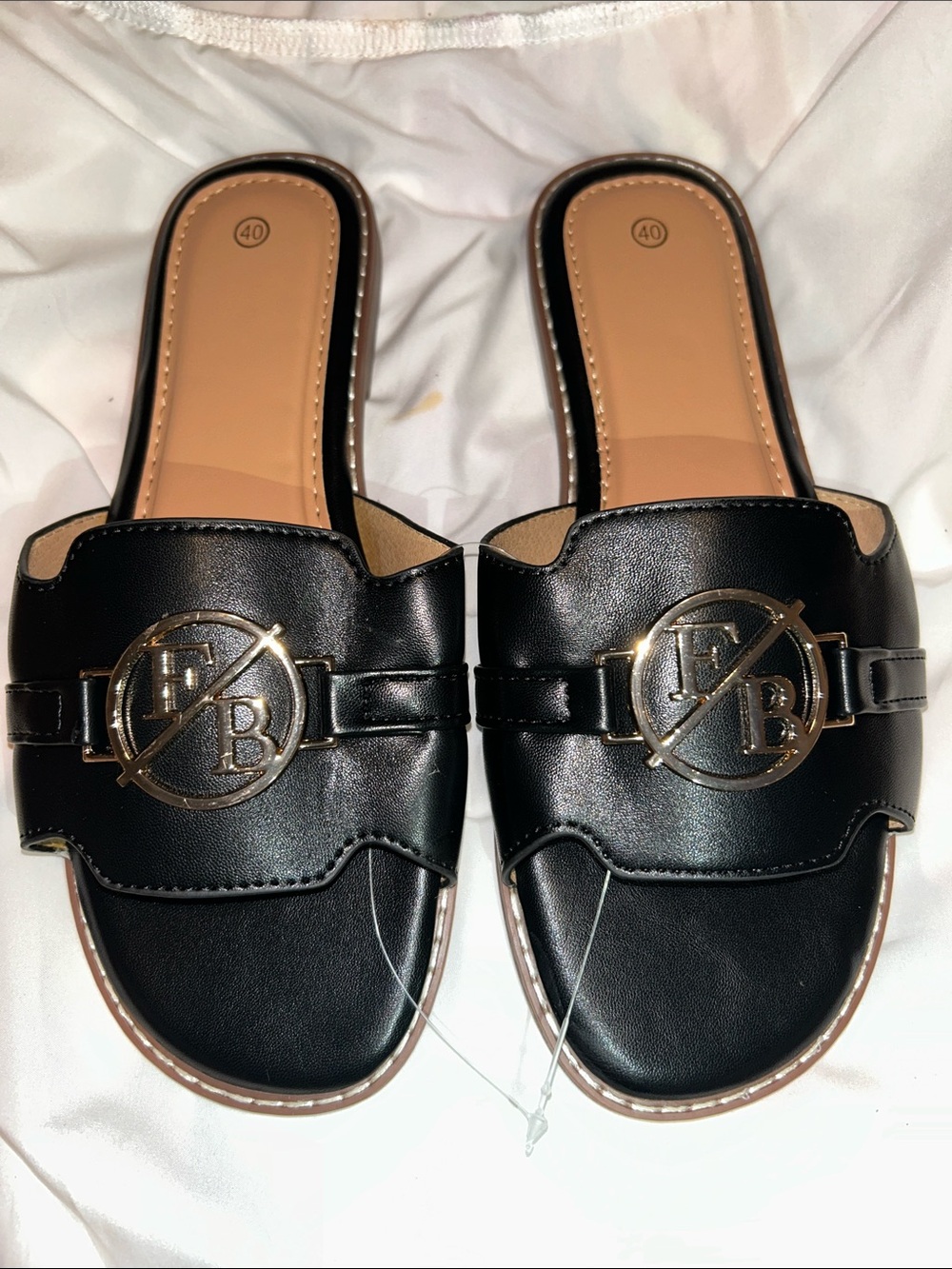 Black Slip-On Women's Mules with Gold Emblem